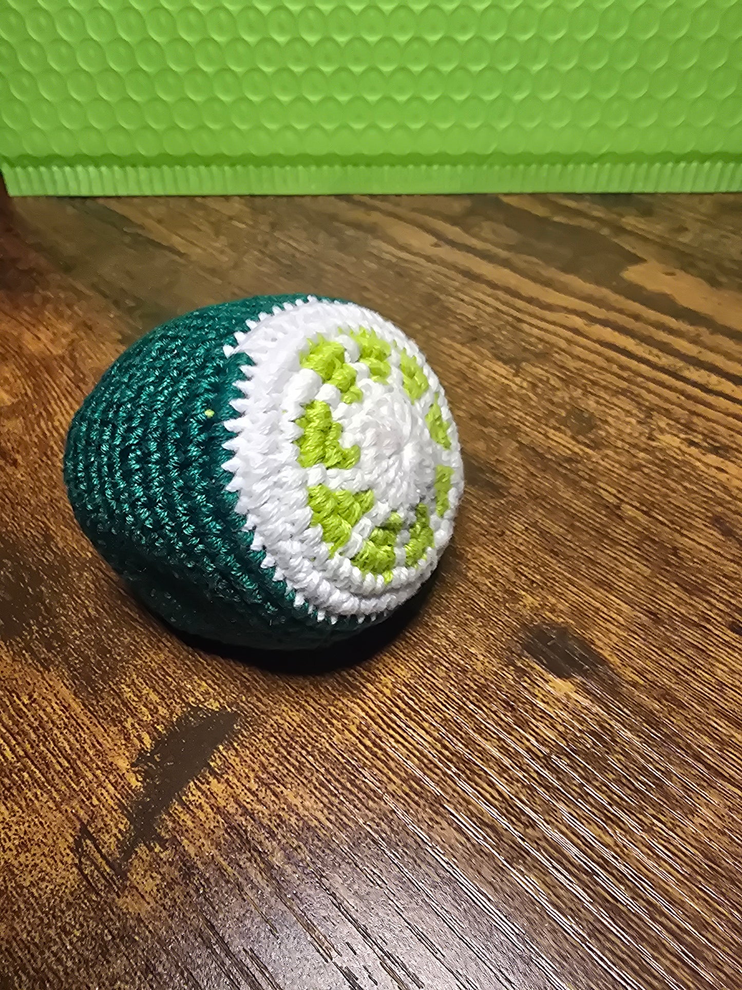 Lime footbag hackysack